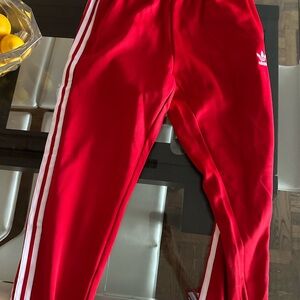 Adidas men’s rock star Red Joggers with White Stripes